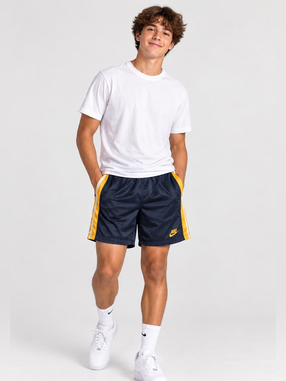 Vintage Nike Navy Athletic Shorts with Yellow Side Stripe